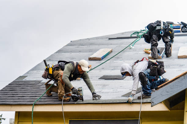 Professional Roofing technician working in East Providence, RI